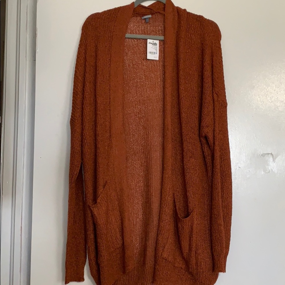 Size medium burnt orange knit cardigan.